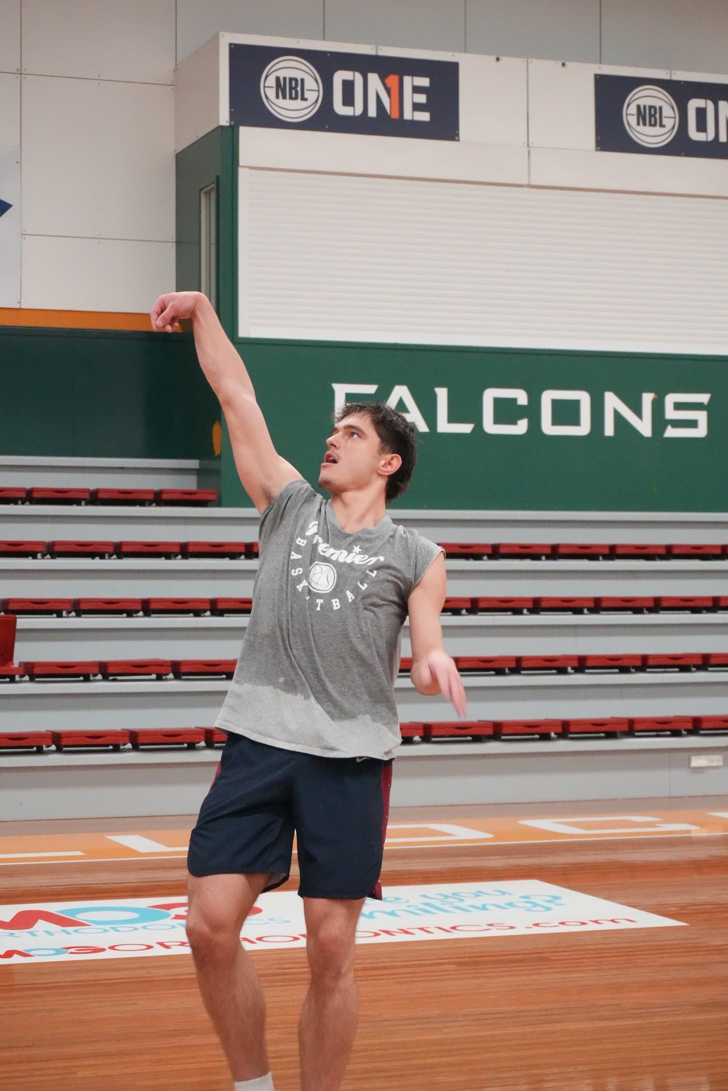 A Waverley Falcons guard following through on a jump shot